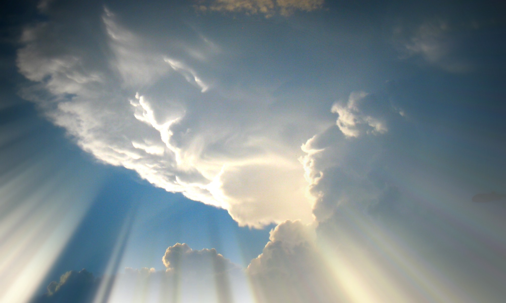 sunlight streaming through clouds