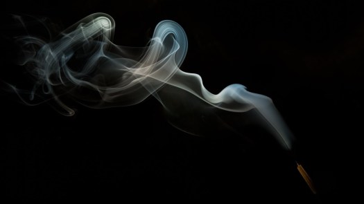 Slow-motion incense smoke.